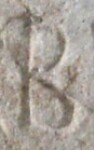 A close-up of an instance of allograph Β type2.2 inscribed on object ISic000668