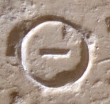 A close-up of an instance of allograph Θ type1 inscribed on object ISic000770