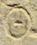 A close-up of an instance of allograph Θ type2.2 inscribed on object ISic001258