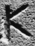A close-up of an instance of allograph Κ type1.3 inscribed on object ISic001439