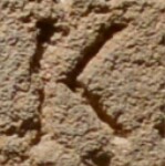 A close-up of an instance of allograph Κ type2.2 inscribed on object ISic001087