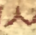 A close-up of an instance of allograph Λ type3 inscribed on object ISic000613