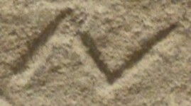 A close-up of an instance of allograph Ν type2.1 inscribed on object ISic001481