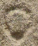 A close-up of an instance of allograph Ο type3 inscribed on object ISic001481