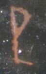 A close-up of an instance of allograph Ρ type2.3 inscribed on object ISic020930