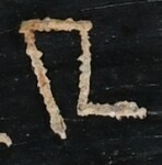 A close-up of an instance of allograph Ρ type2.6 inscribed on object ISic020371