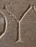 A close-up of an instance of allograph Υ type2.1 inscribed on object ISic003351