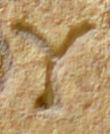 A close-up of an instance of allograph Υ type2.2 inscribed on object ISic003367
