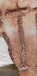 A close-up of an instance of allograph   inscribed on an object