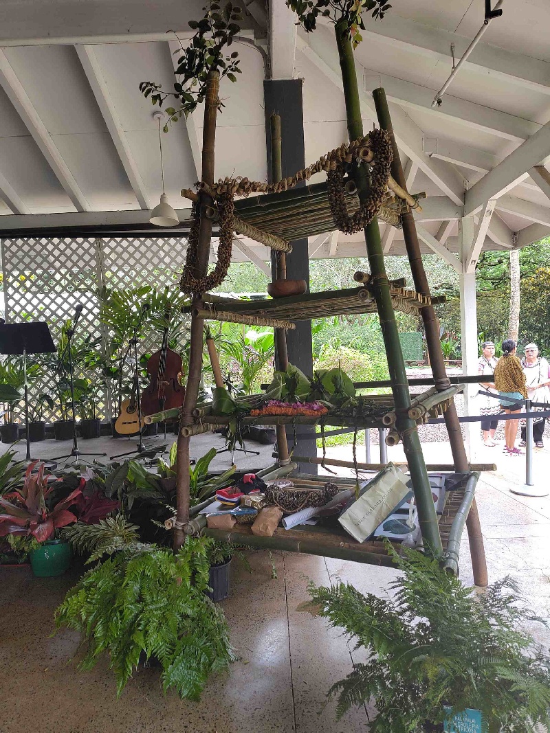 A Lele with four levels, on which flowers, greenery and lei are hung, holds the Mauri Stone and gifts given as part of the IILF Hawaii opening ceremony.